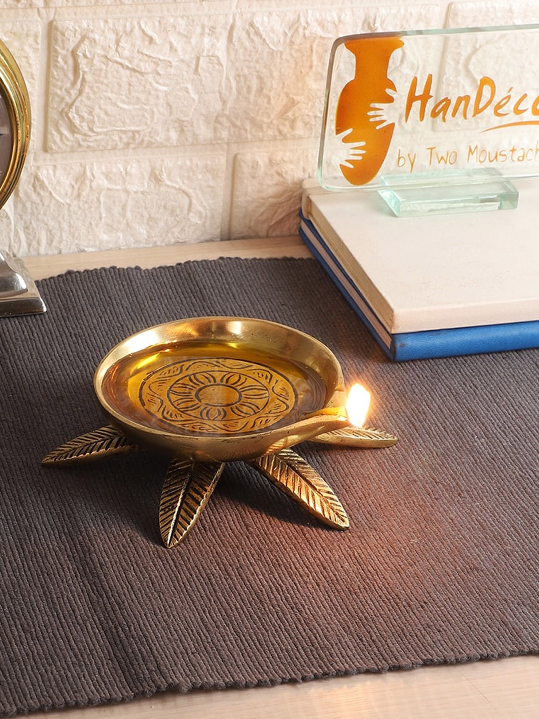 

Two Moustaches Brown Textured Brass Diya