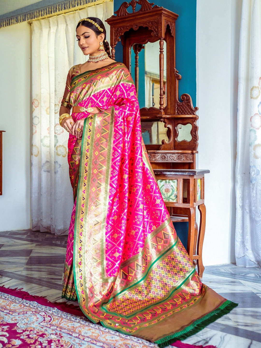 

Mitera Ethnic Motifs Woven Design Zari Patola Saree, Pink
