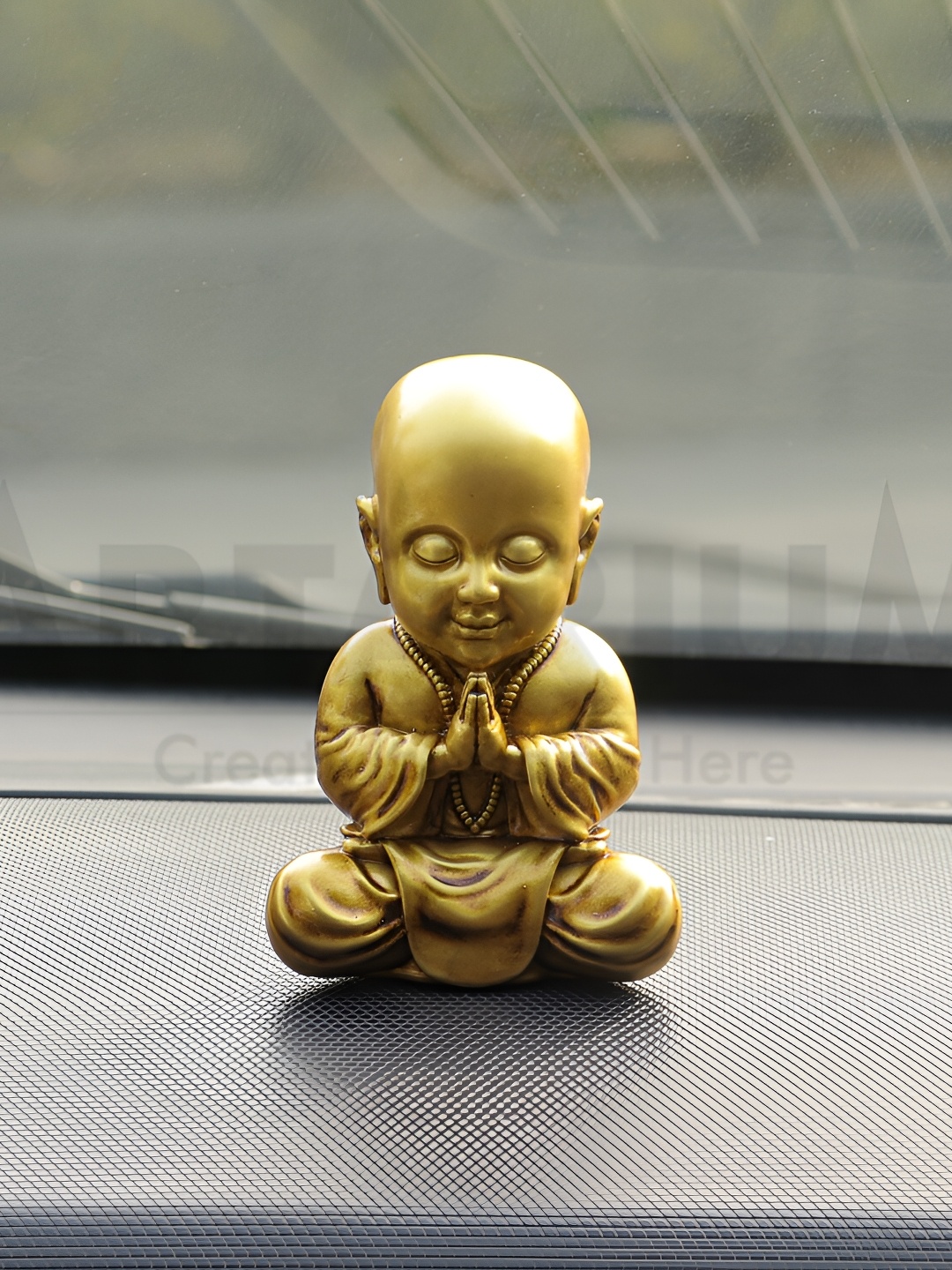 

Artarium LLP Gold Toned Meditaing Monk Showpiece
