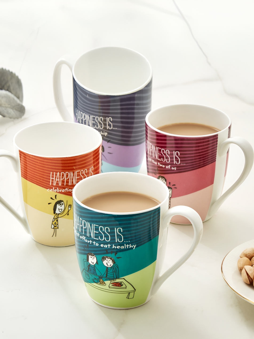 

Home Centre Blue & Red 4 Pieces Glossy Printed Mugs 340 ml Each