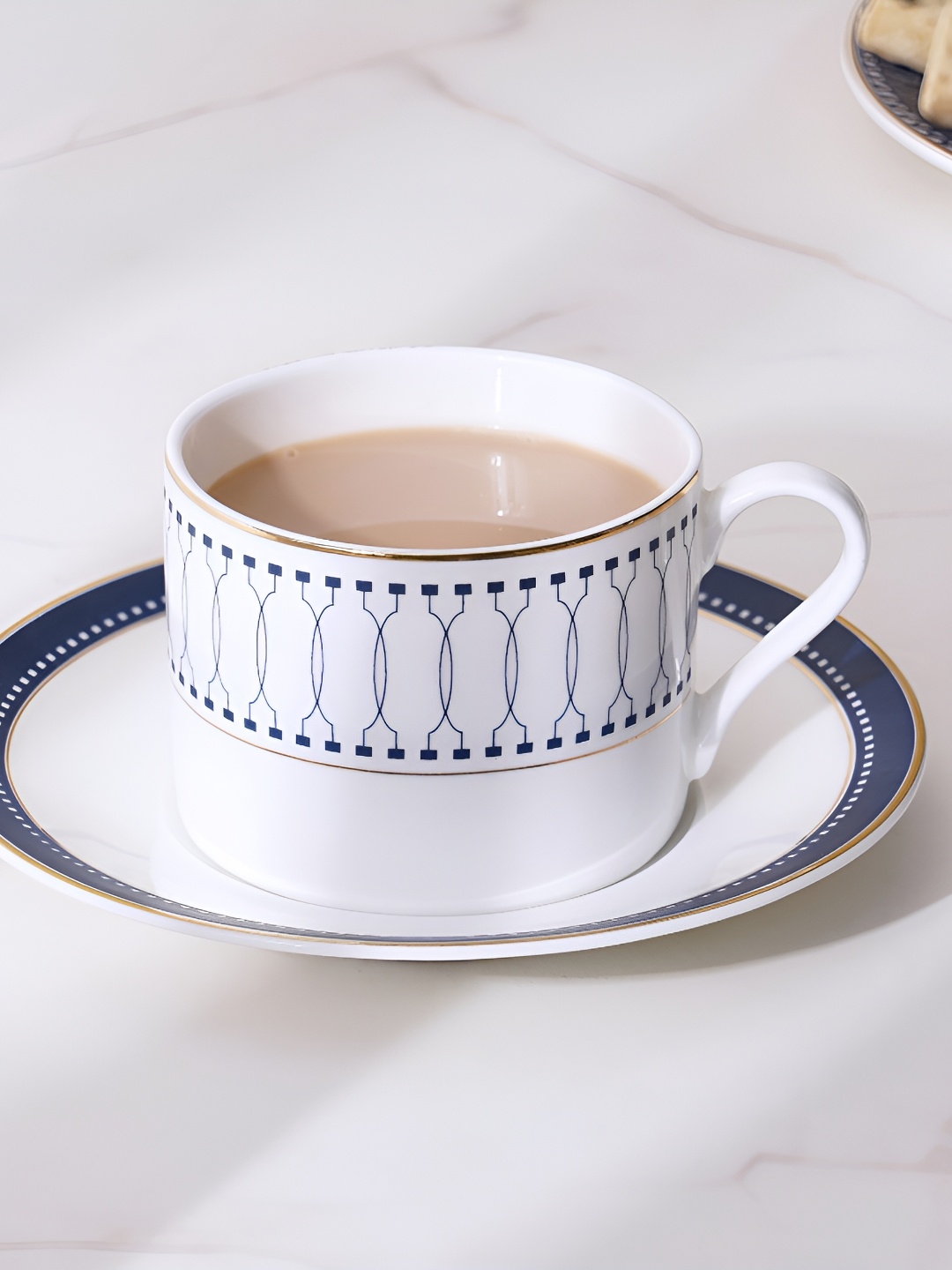 

Home Centre Blue & White Geometric Printed Altius Winter Sky Matte Cups and Saucers 200 ml