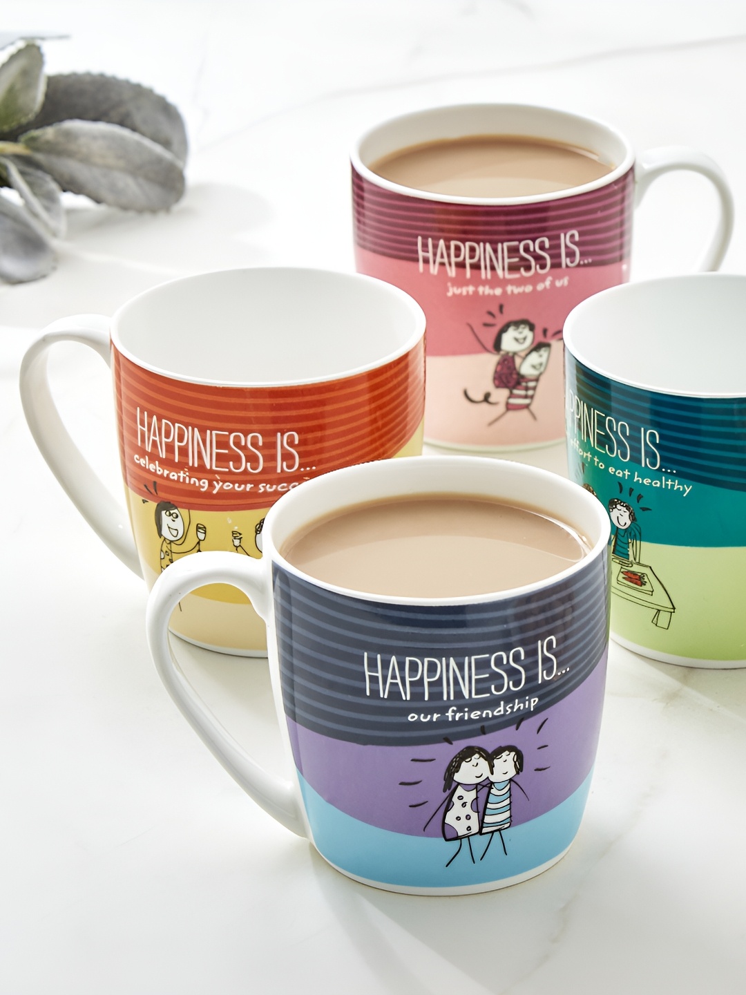 

Home Centre Green & Orange 4 Pieces Printed Melina Happiness Cooper Glossy Mugs 240 ml