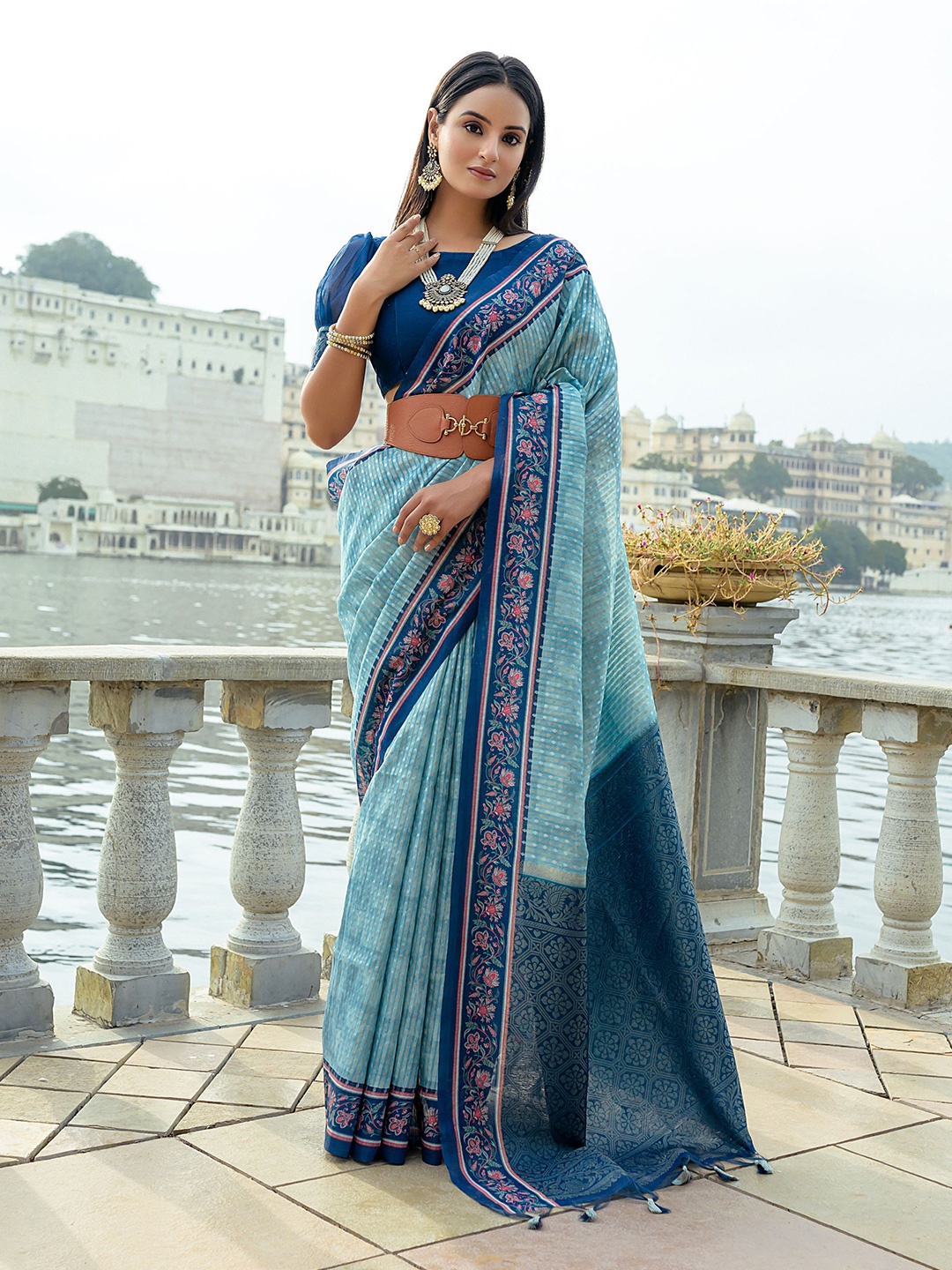 

Mitera Blue Ethnic Motifs Woven Design Zari Saree