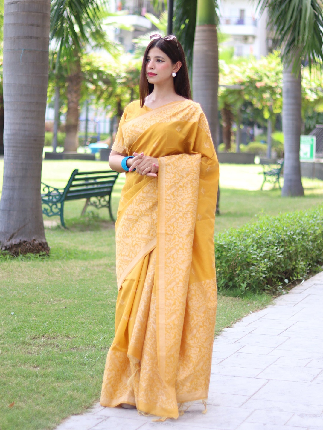 

Mitera Yellow Ethnic Motifs Woven Design Zari Saree