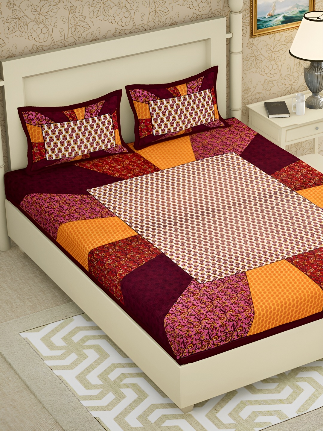 

POORAK Maroon & Yellow Floral Printed 104 TC Cotton Queen Bedsheet Set