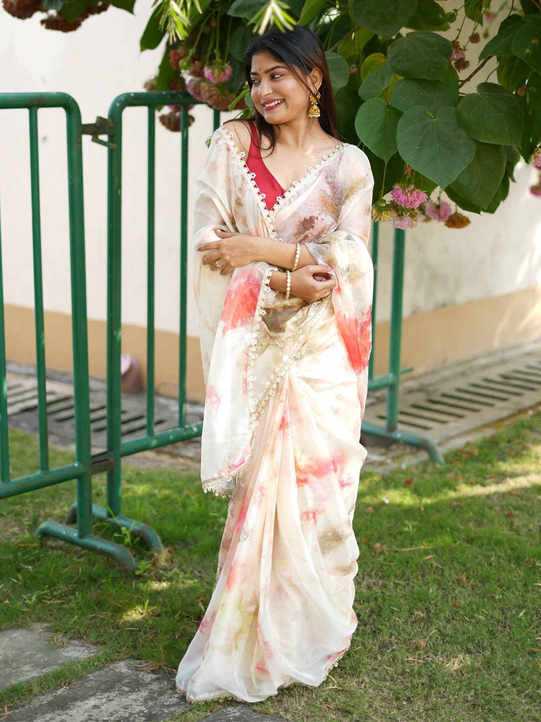 

Mitera Pink & Green Tie and Dye Embroidered Organza Saree