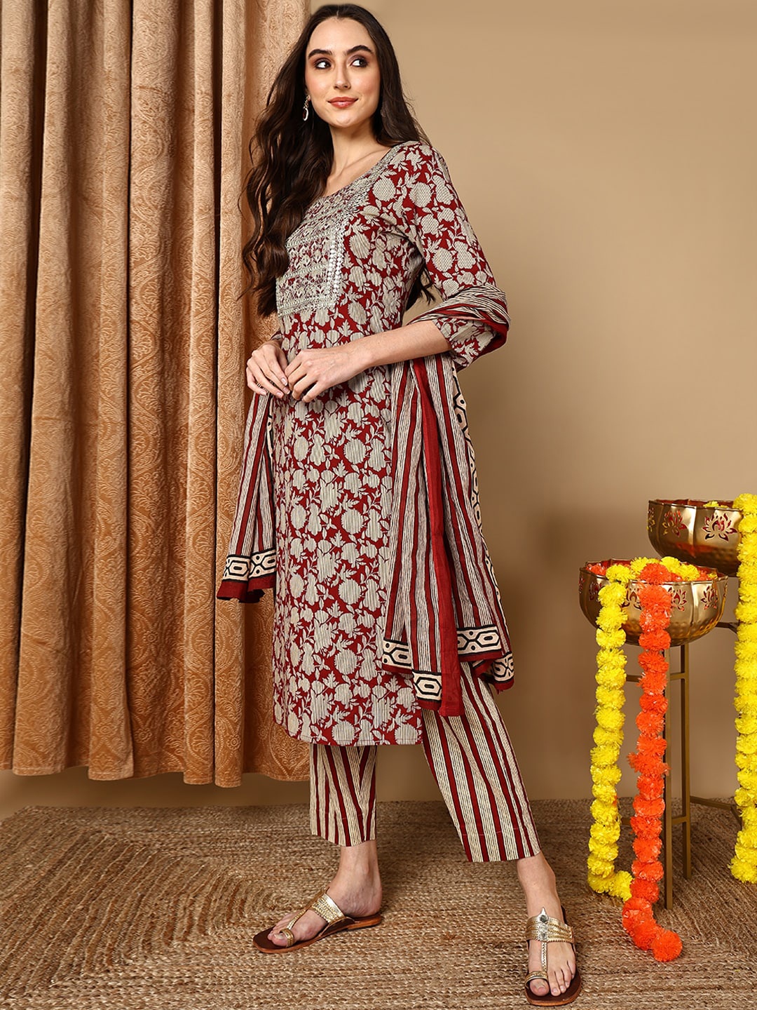 

AHIKA Maroon Floral Printed Round Neck Thread Work Straight Kurta With Trouser & Dupatta