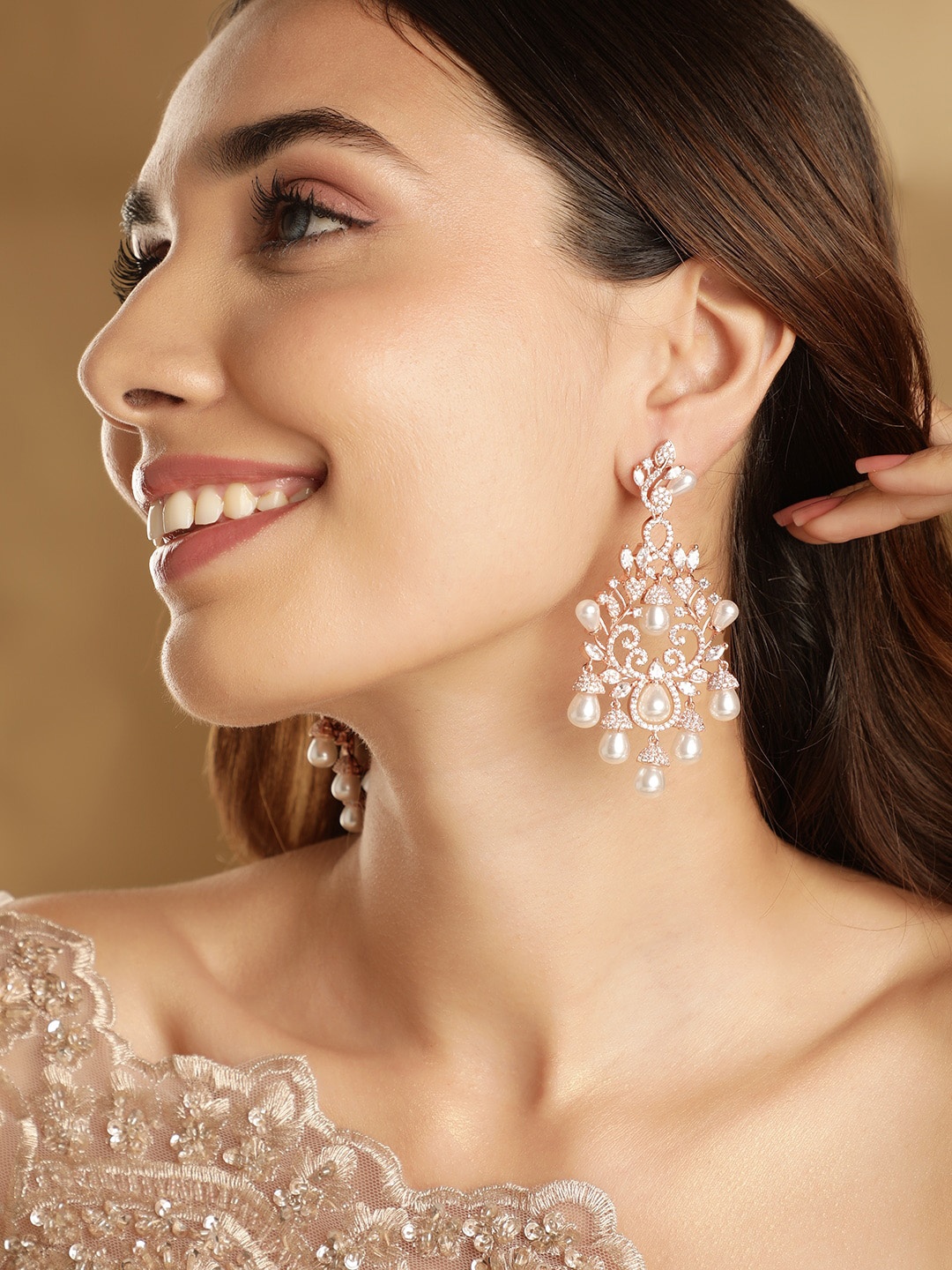 

Rubans Rose Gold Plated AD Studded Chandelier Earrings with Pearl Drops