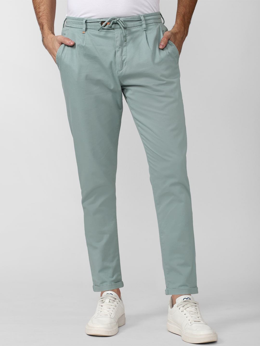 

Peter England Casuals Men Carrot Fit Mid-Rise Pleated Trousers, Green