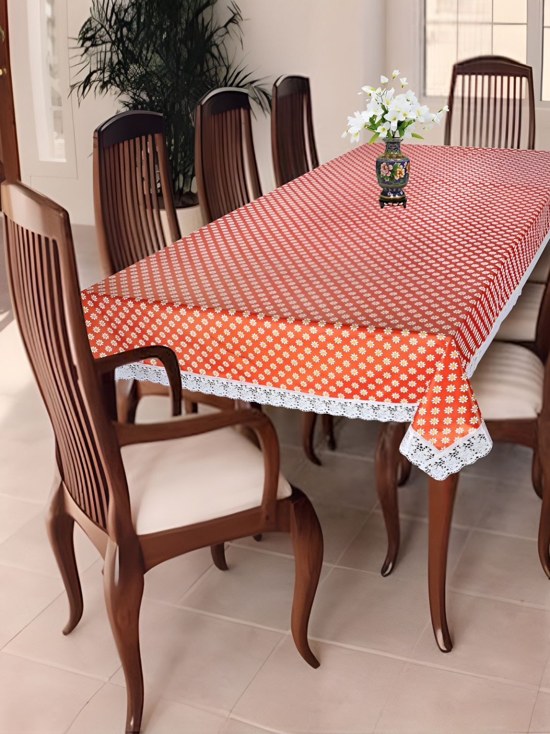 

Homerz Orange Floral Waterproof Plastic 8-Seater Table Cover