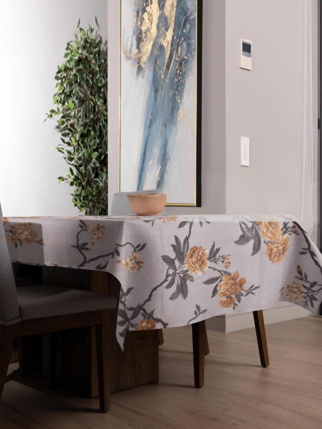 

Homerz Mustard Floral Waterproof Plastic 4-Seater Table Cover