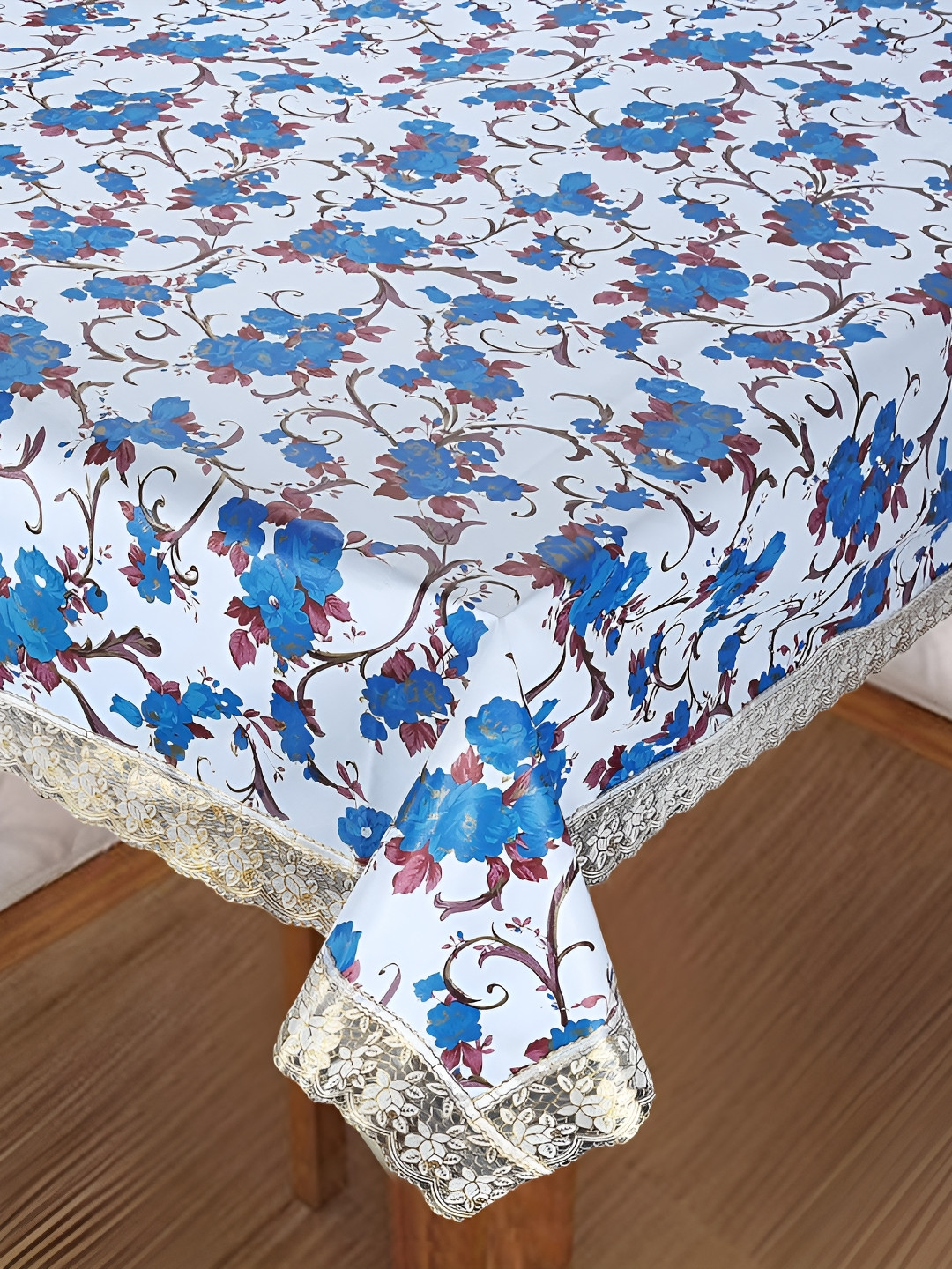 

Homerz White Floral Waterproof Plastic 8-Seater Table Cover