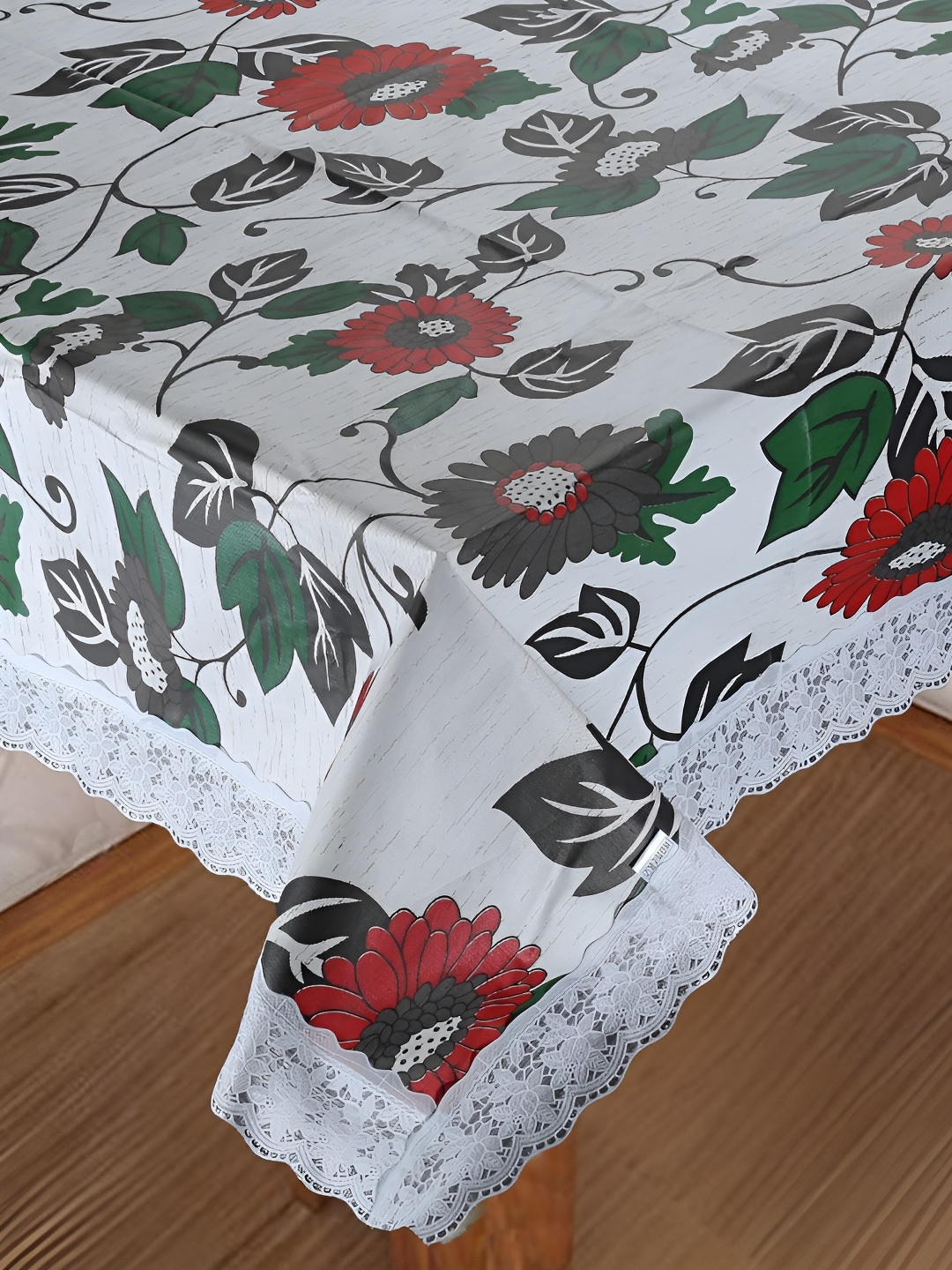 

Homerz White Floral Waterproof Plastic 8-Seater Table Cover