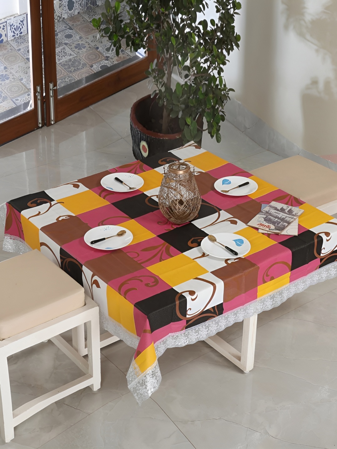 

Homerz White Geometric Printed Waterproof Plastic 4-Seater Table Cover