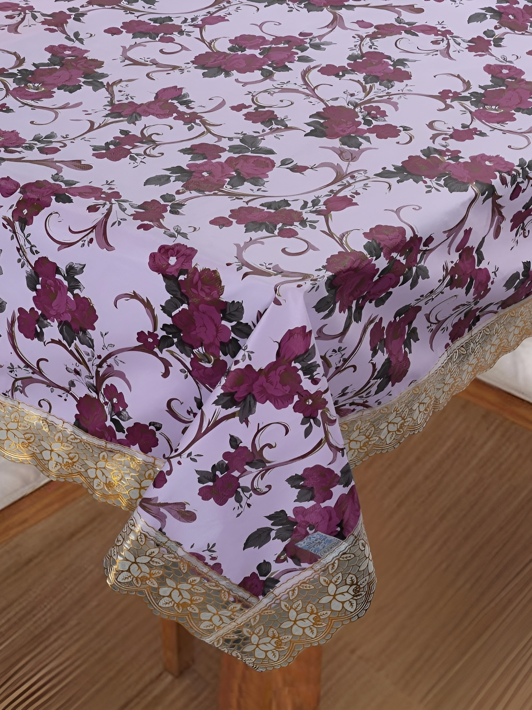 

Homerz Purple Floral Waterproof Plastic 6-Seater Table Cover