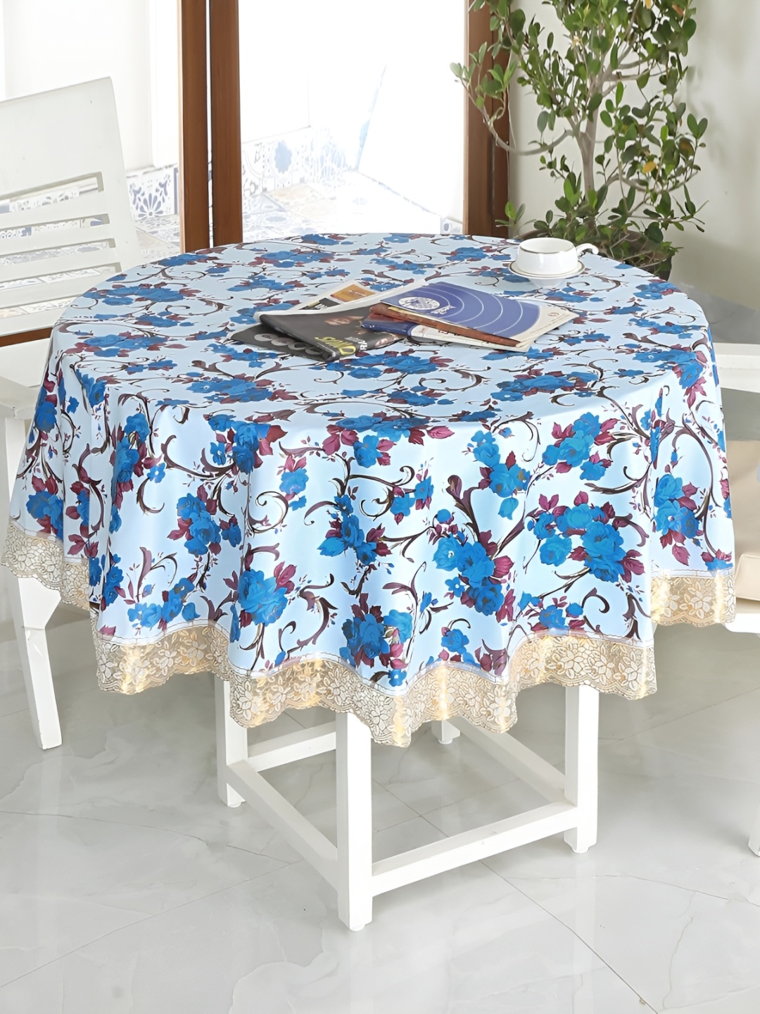 

Homerz Blue Floral Waterproof Plastic Round 4-Seater Table Cover