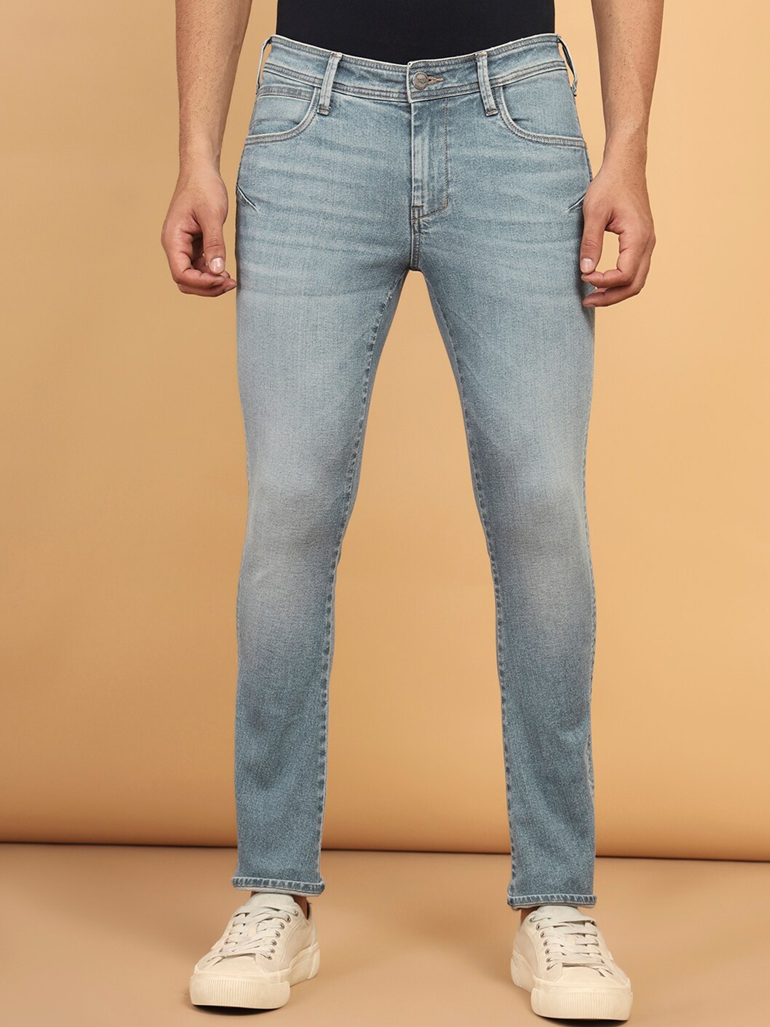 

Wrangler Men Vegas Skinny Fit Low-Rise Clean Look Light Fade Cropped Stretchable Jeans, Blue