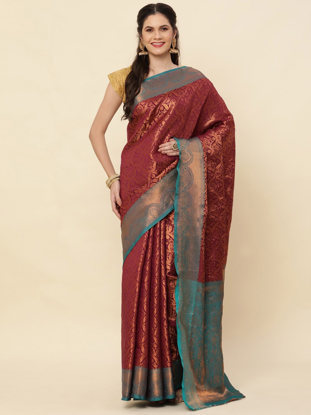 

Sorathiya Enterprise Woven Design Zari Silk Blend Kanjeevaram Saree, Maroon