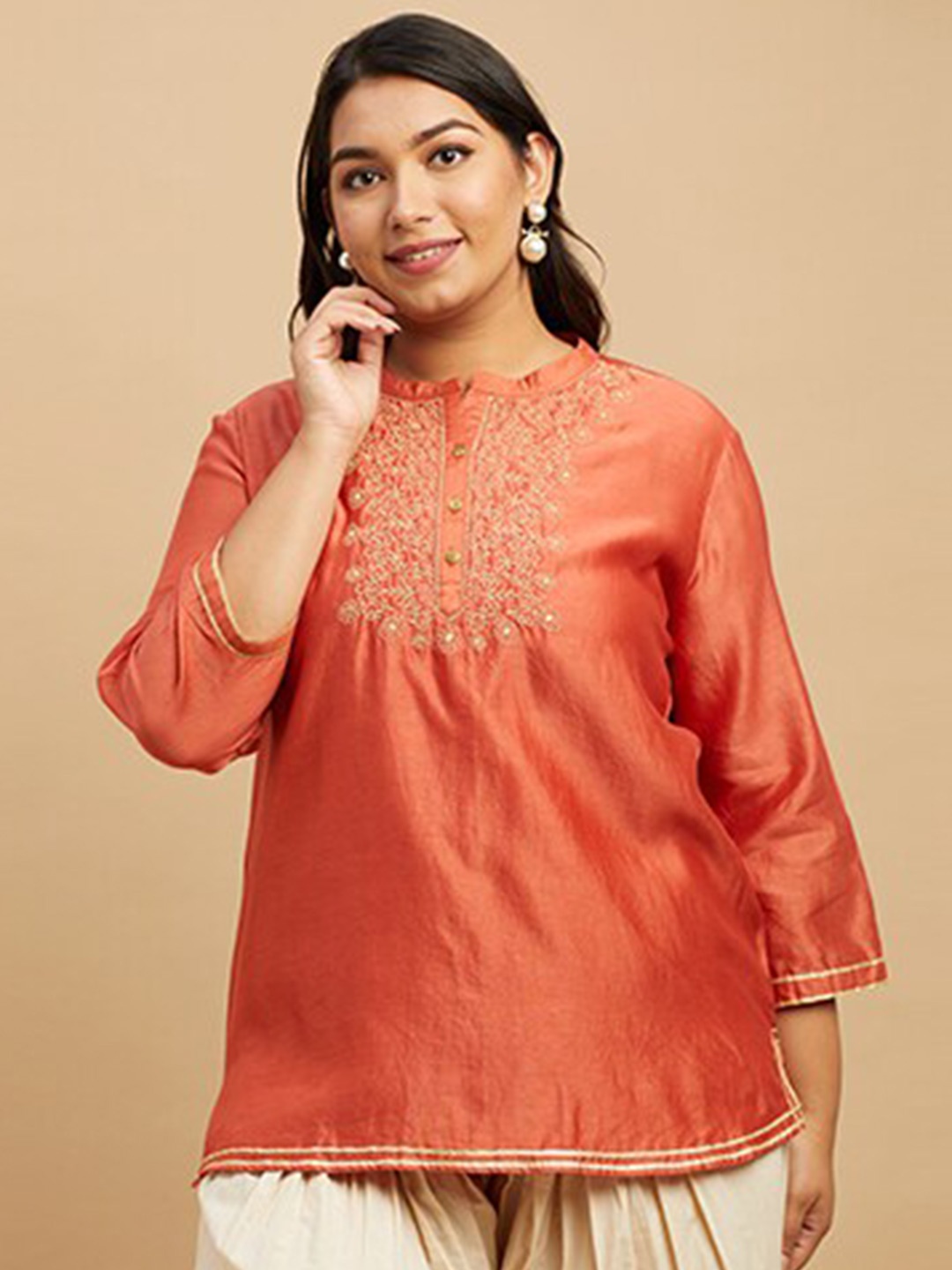 

Big Hello - The Plus Life Embroidered Thread Work Thread Work Kurti, Orange