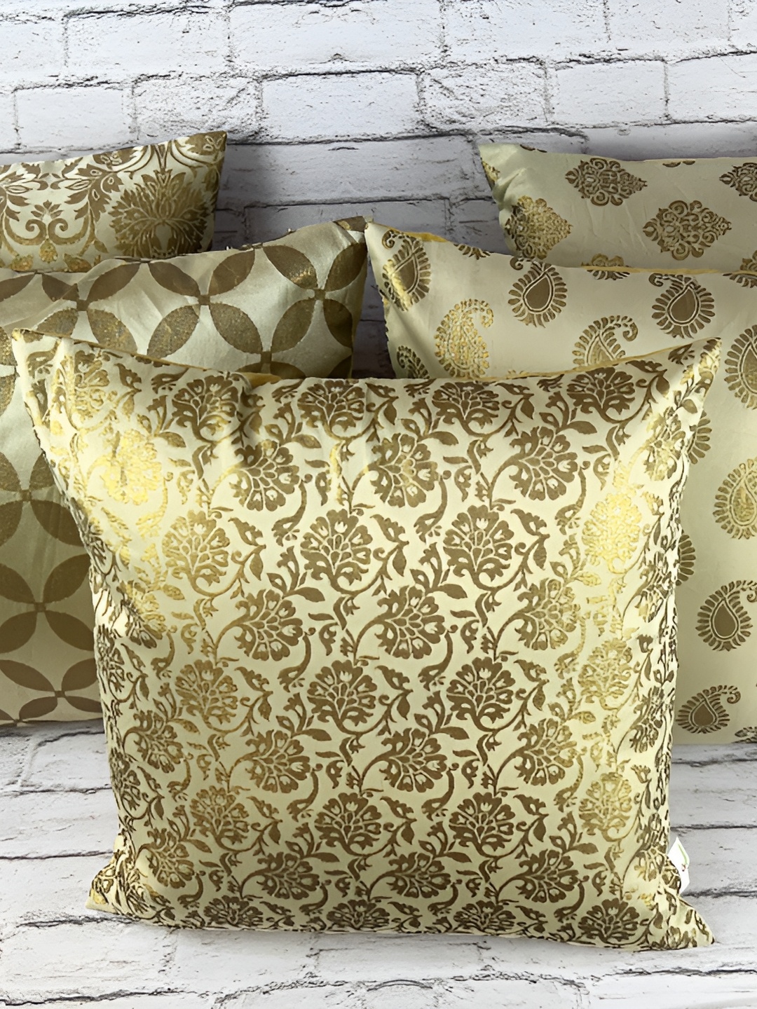 

Pink Parrot White & Gold-Toned Set of 5 Ethnic Motifs Square Cushion Covers