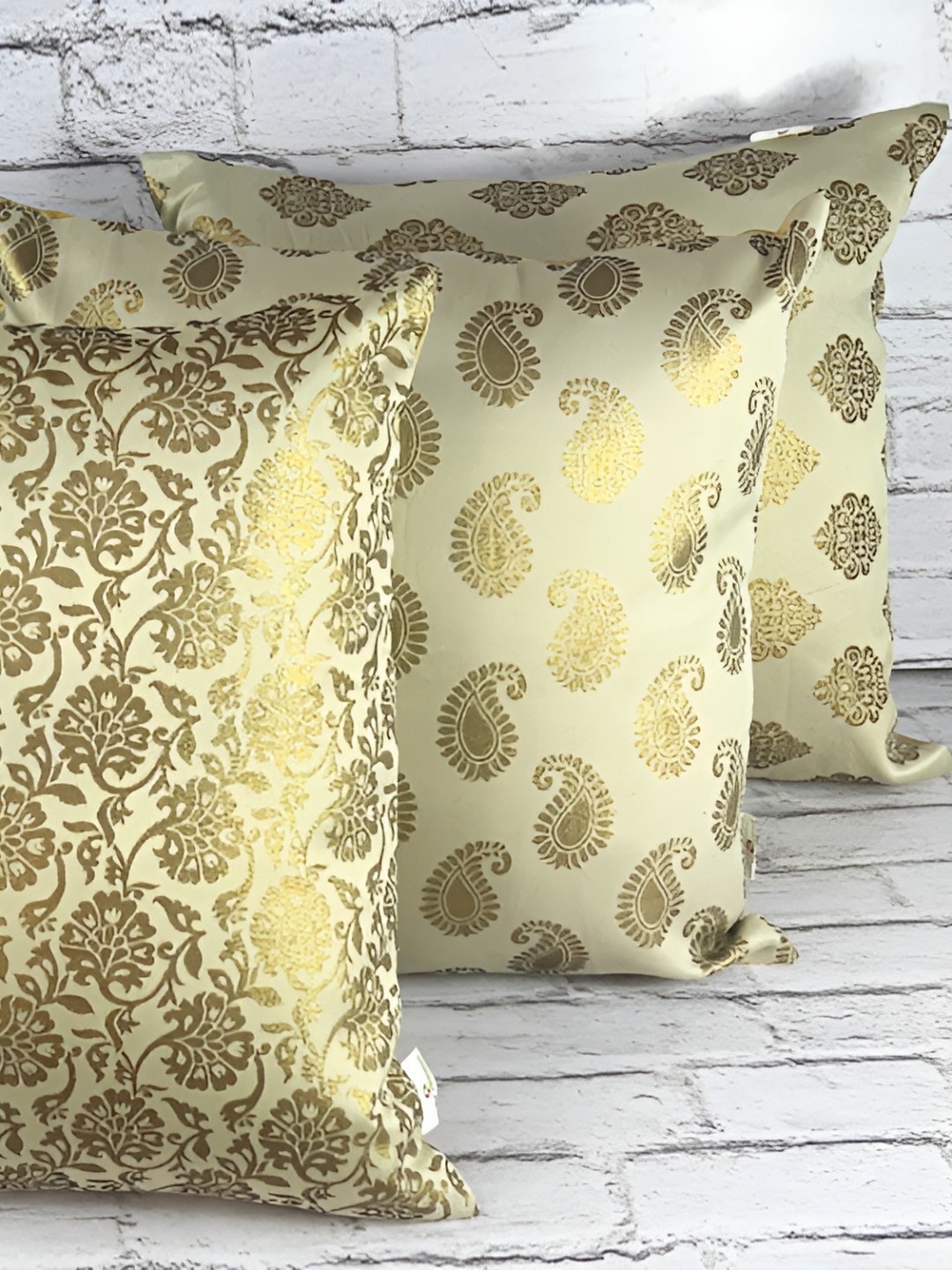 

Pink Parrot White & Gold-Toned Set of 5 Ethnic Motifs Square Cushion Covers