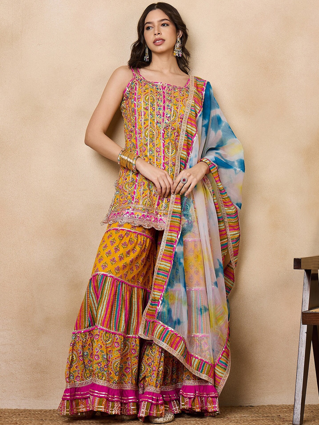 

KAVINDI Women Ethnic Motifs Printed Regular Thread Work Pure Cotton Top with Sharara & With Dupatta, Mustard