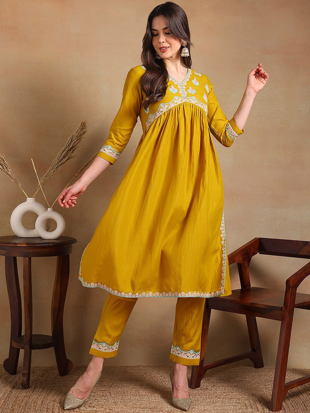 

AHIKA Women Embroidered Empire Thread Work Kurta with Trousers, Yellow