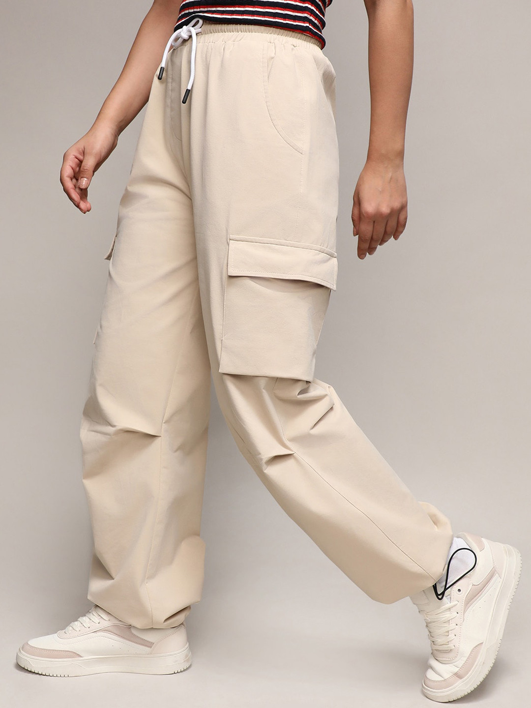 

Campus Sutra Women Relaxed Loose Fit Easy Wash Parachute Trousers, Beige