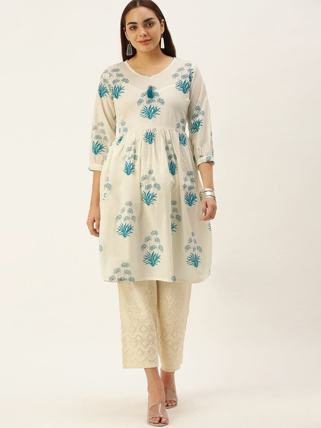 

KALINI Women Floral Printed Thread Work Indie Prints Kurta, Mustard