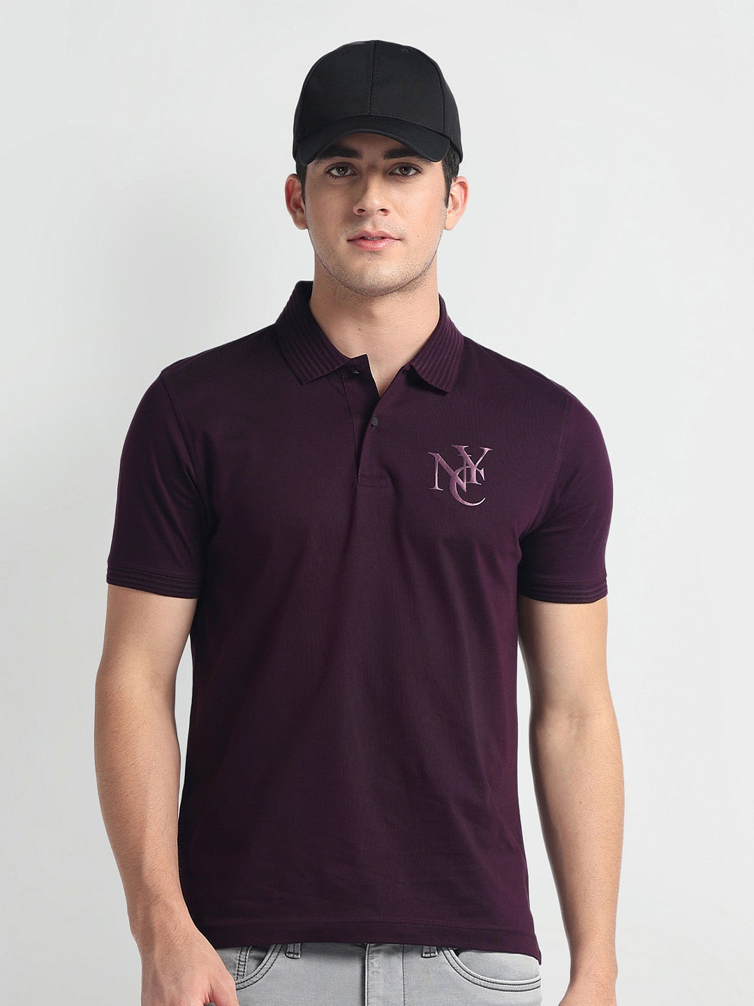 

Arrow New York Men Polo Collar T-shirt, Purple