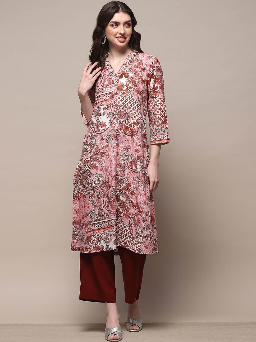 

Biba Women Floral Printed Flared Sleeves Sequinned Kurta, Pink