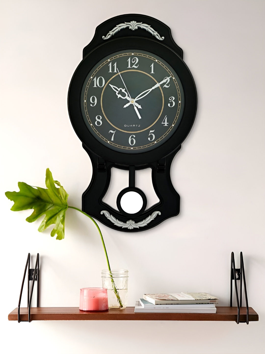 

Craft Smith Black Embellished Abstract Shaped Traditional Wall Clock