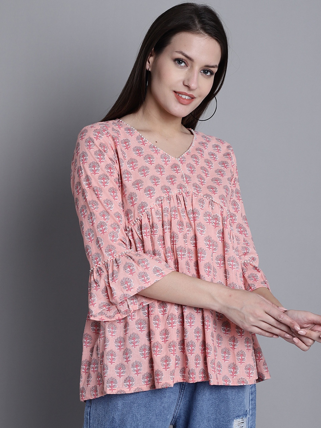 

KALINI Floral Printed Bell Sleeve Studded Cotton Empire Top, Peach