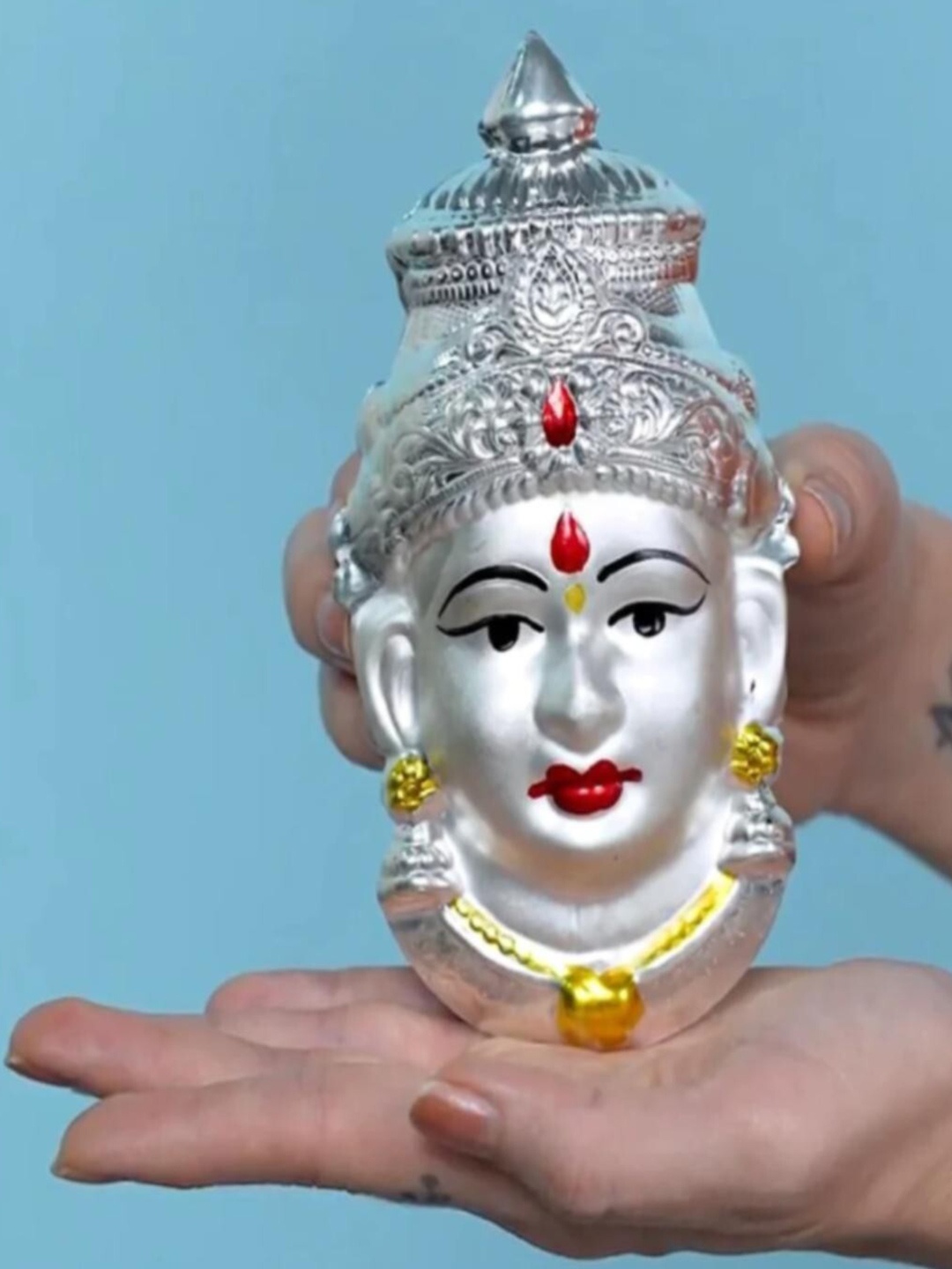 

Sigaram Silver Toned & Black Textured Lakshmi Face Mukoot