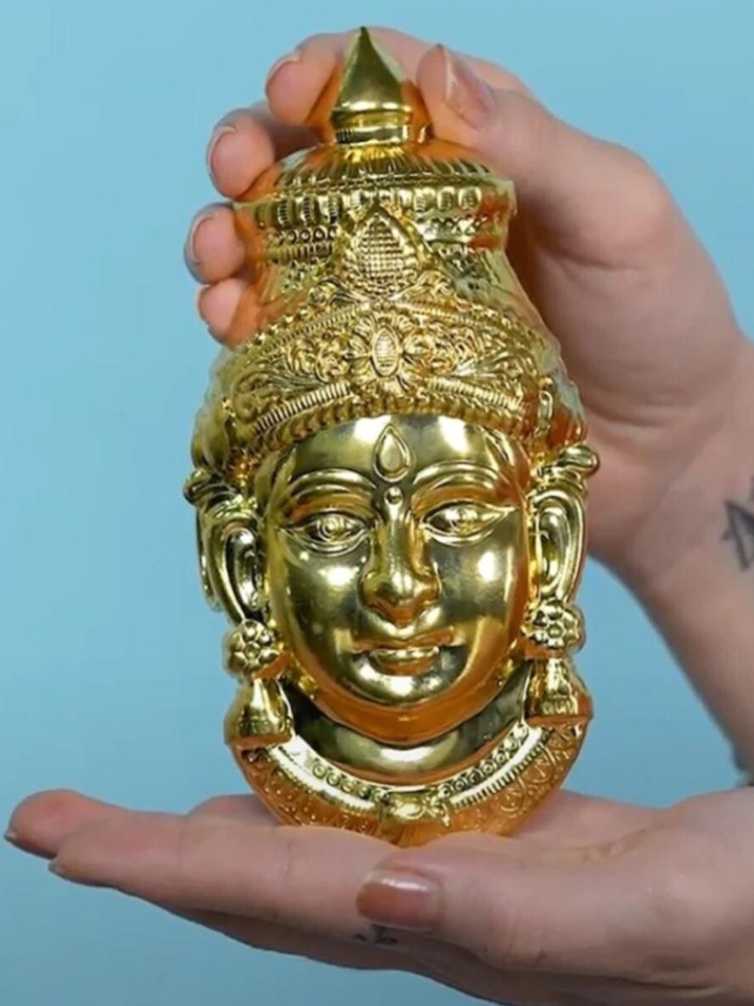 

Sigaram Gold Toned Textured Lakshmi Face Mukoot