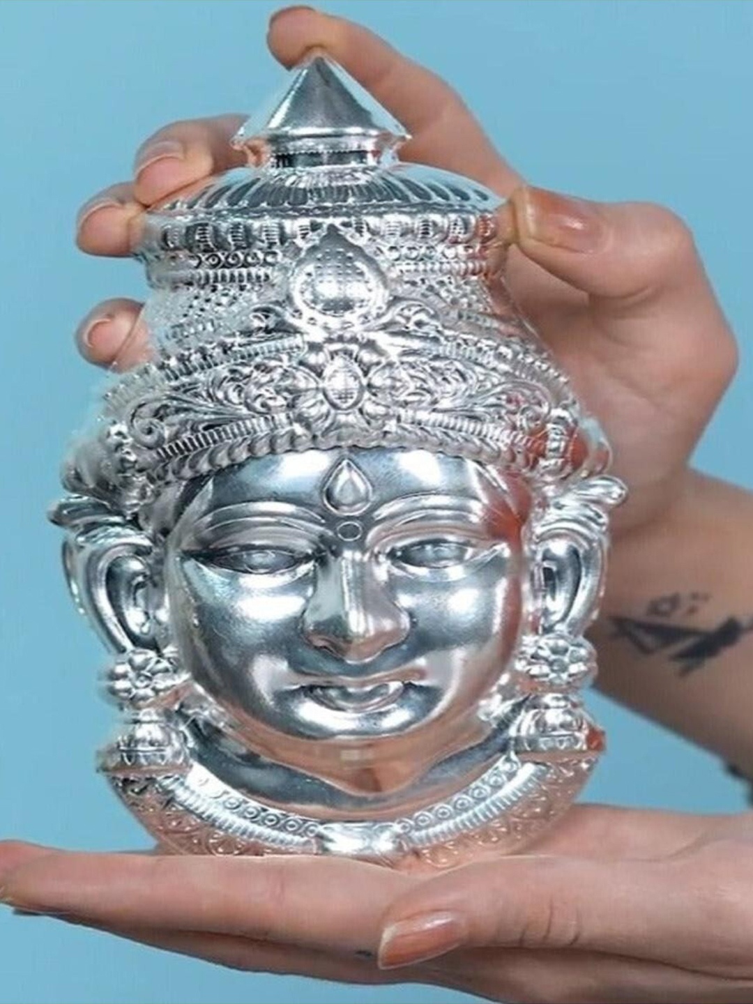 

Sigaram Silver Toned Textured Vara Mahalakshmi Face Mukoot