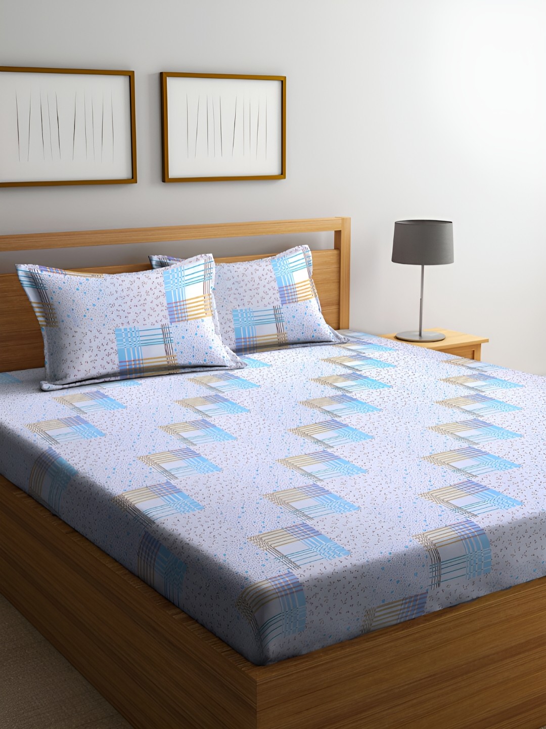 

BOMBAY DYEING Blue & White Floral 144 TC King Bedsheet with 2 Pillow Covers