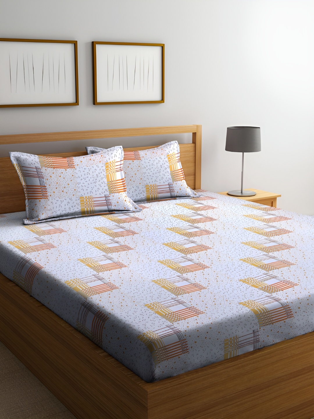 

BOMBAY DYEING Yellow & Off White 144 TC King Bedsheet with 2 Pillow Covers