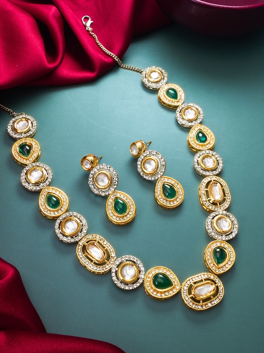 

aadita Gold-Plated Stone Studded Jewellery Set