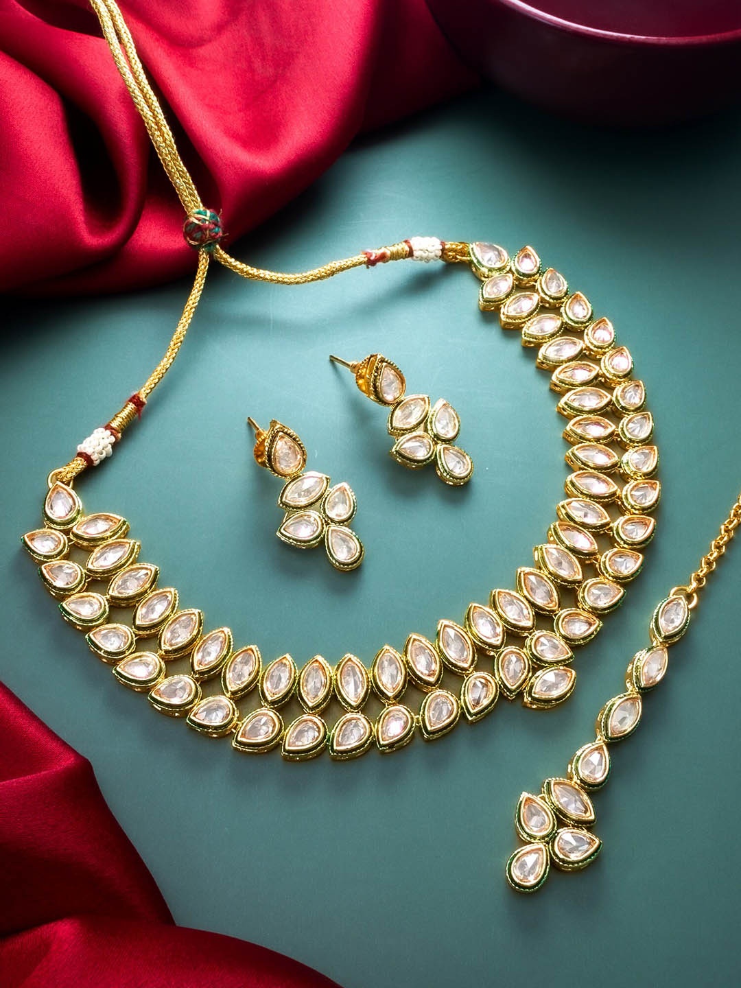 

aadita Gold-Plated Stone Studded Jewellery Set