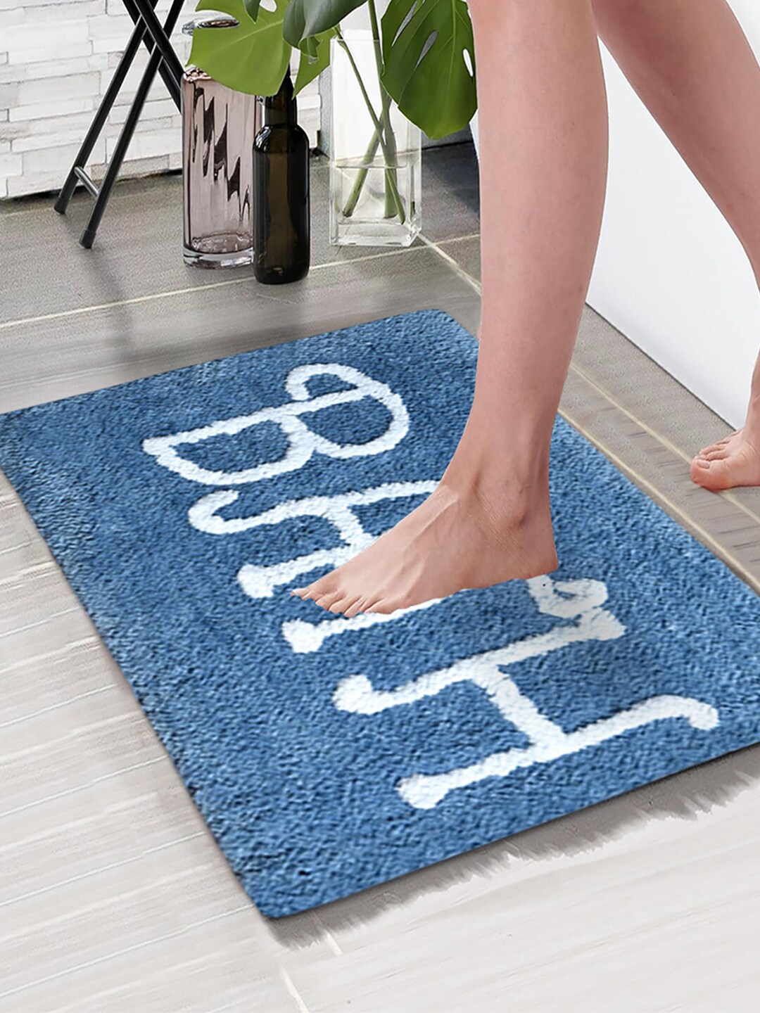 

Aura Turquoise Blue & White Printed Rectangular 1850 GSM Microfiber Bath Rug