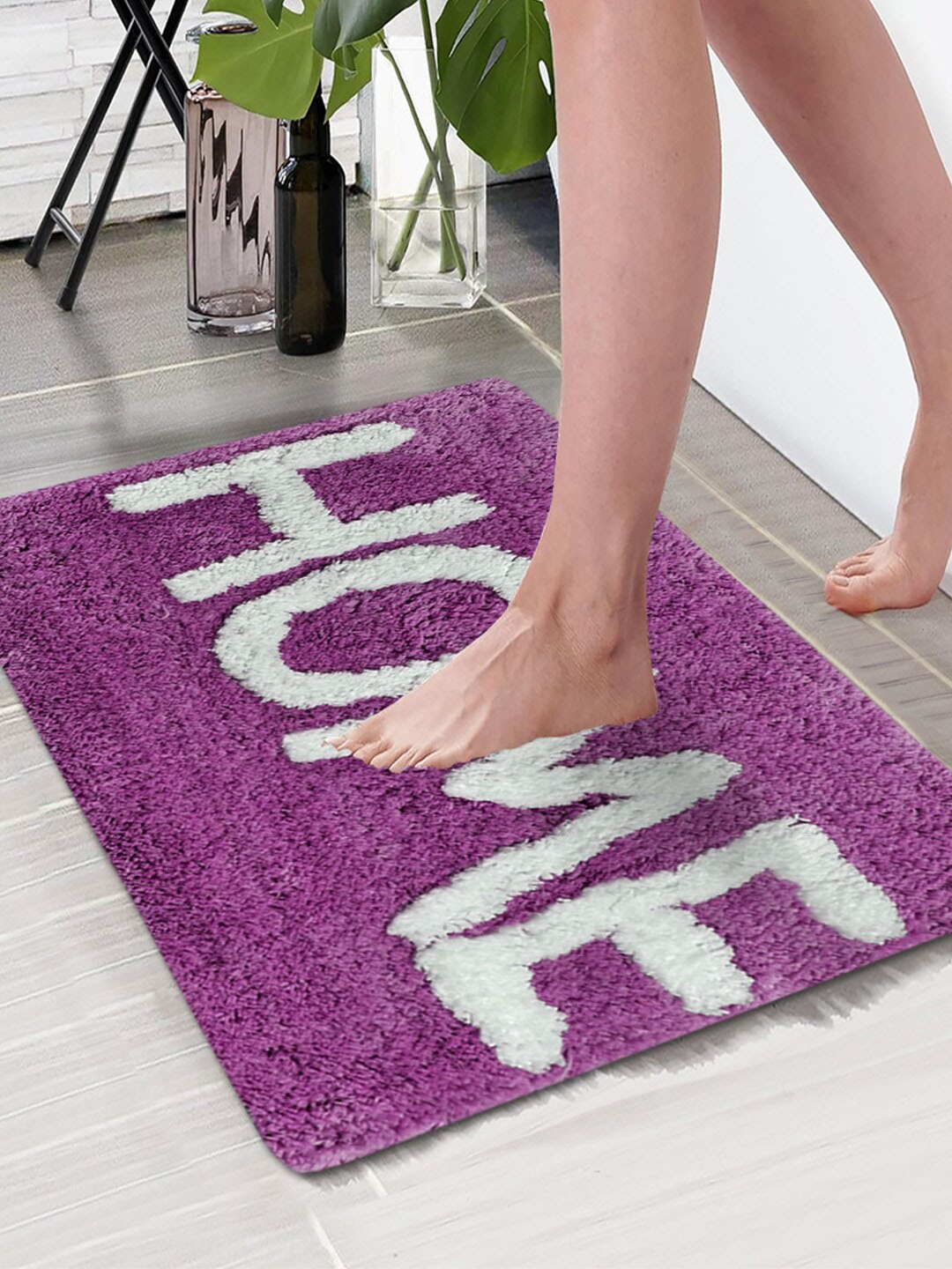 

Aura Purple & White Printed Rectangular 1850 GSM Anti Skid Bath Rug