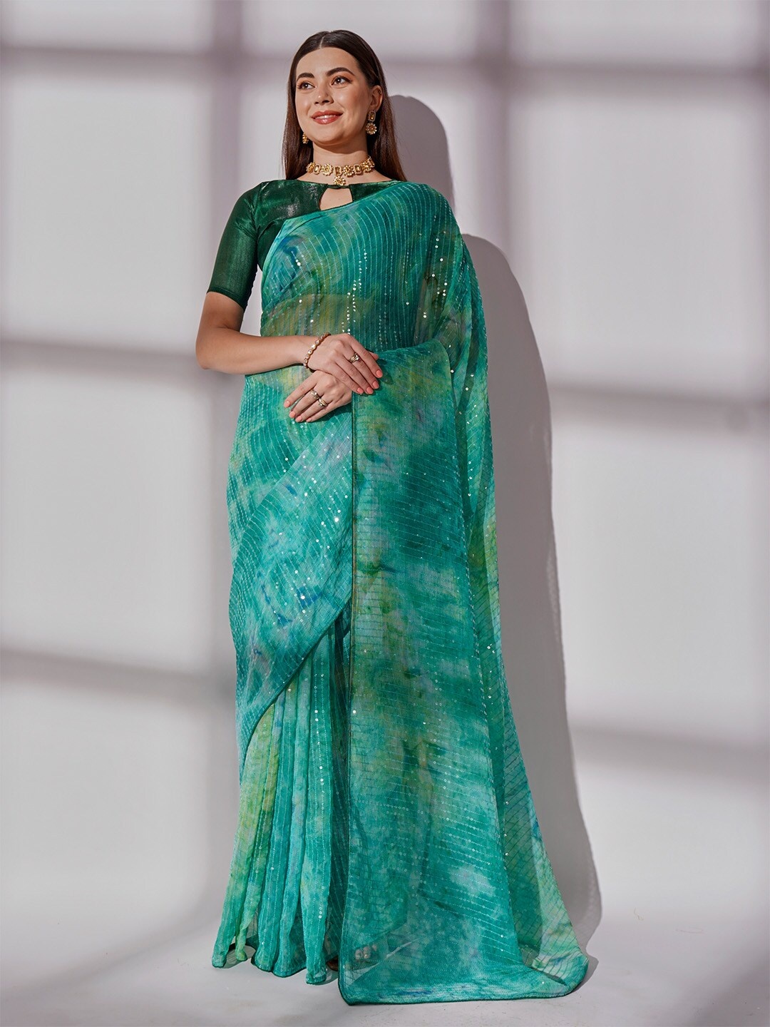

Ishin Embellished Sequinned Pure Georgette Saree, Sea green