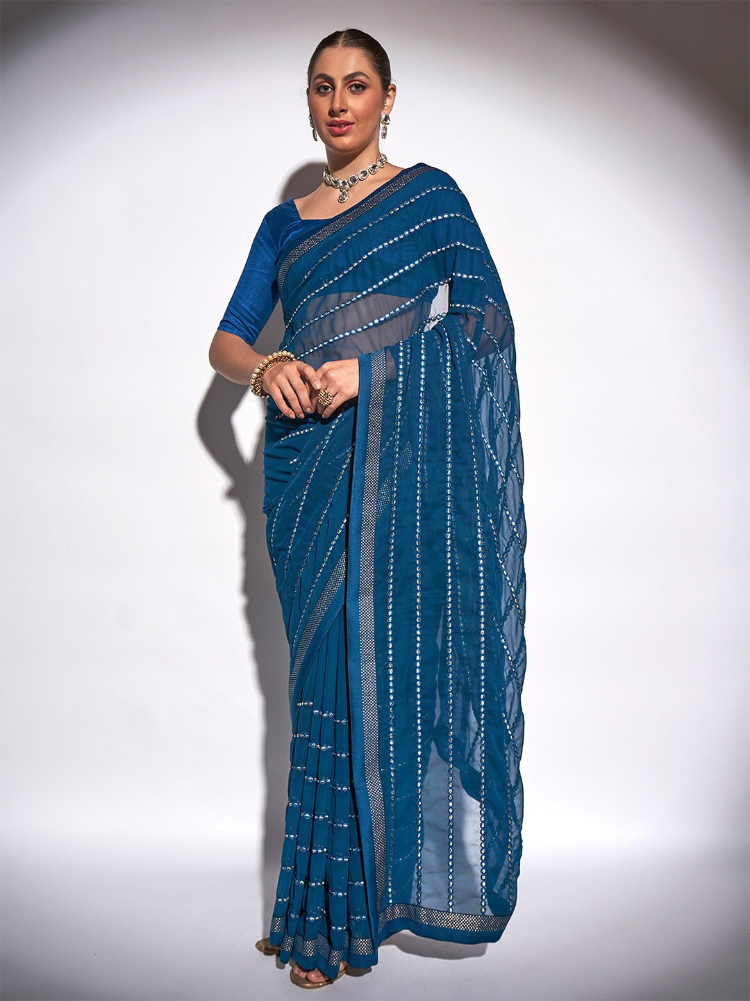 

Ishin Floral Embroidered Pure Georgette Saree, Teal