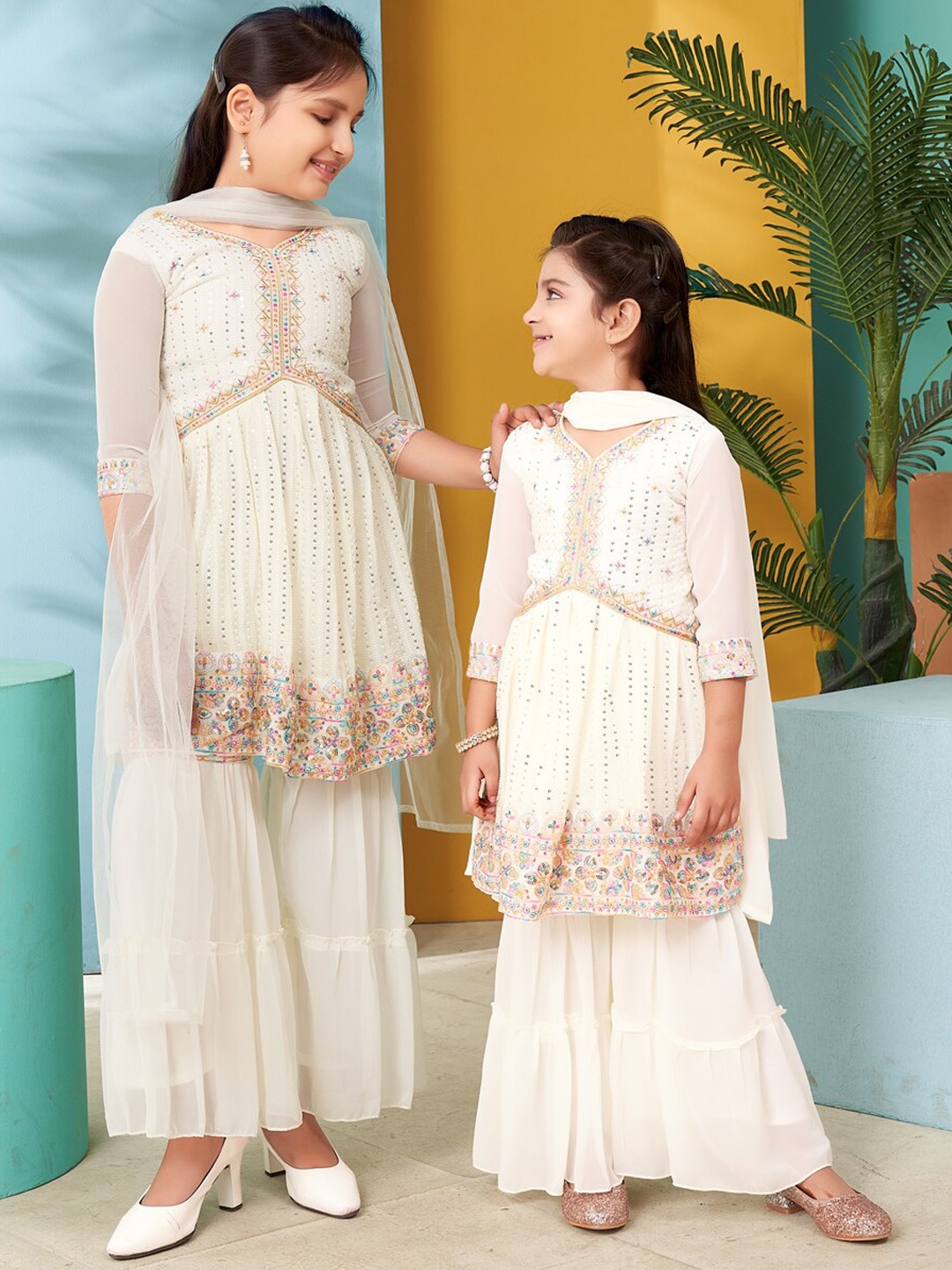 

Aarika Girls Ethnic Motifs Embroidered Empire Thread Work Kurta with Sharara & With Dupatta, Cream