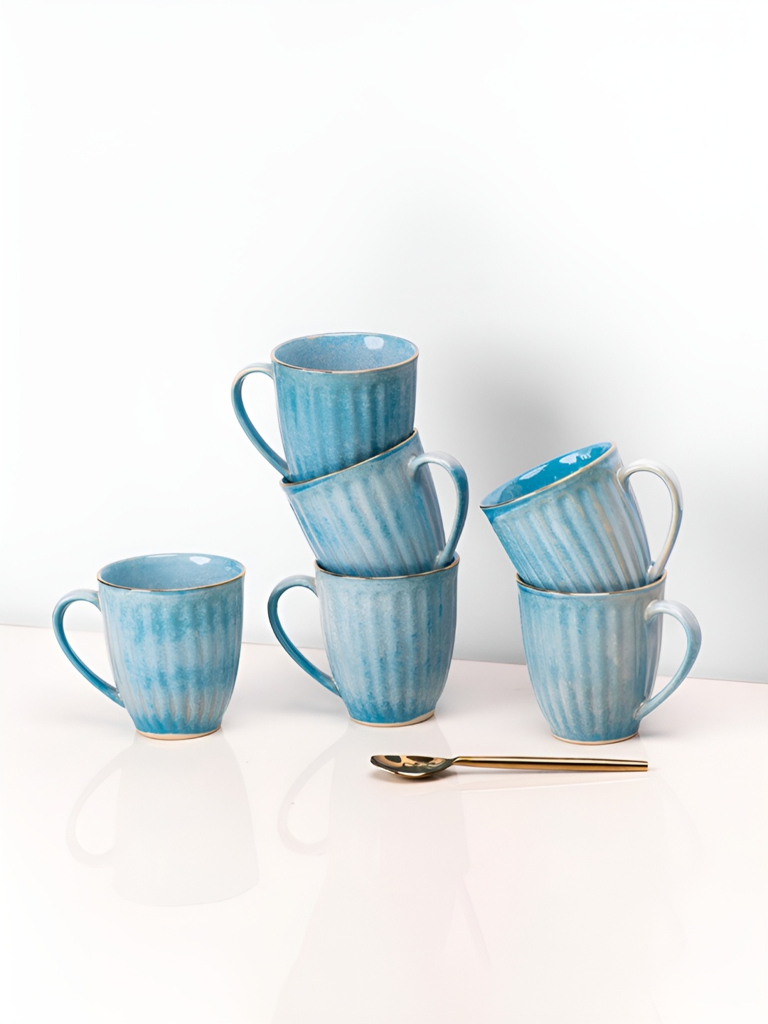 

ARAVALII Blue 4 Pieces Textured Ceramic Glossy Mugs 300ml each