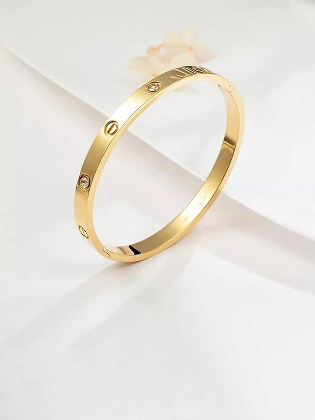 

Fashion Frill Women American Diamond Handcrafted Gold-Plated Kada Bracelet