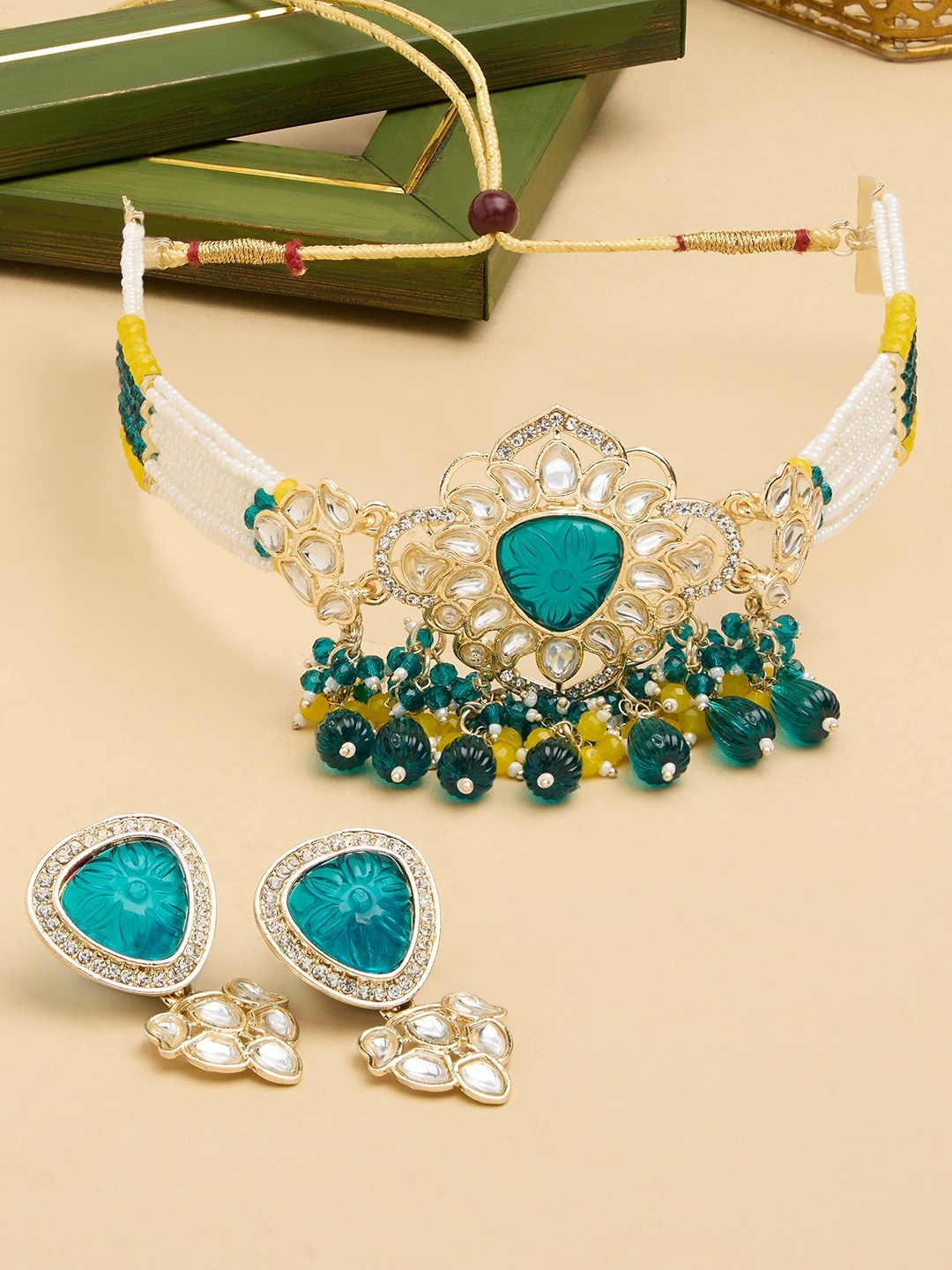 

Zaveri Pearls Gold-Plated Stone Studded & Beaded Jewellery Set