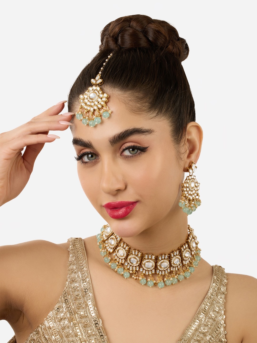

Zaveri Pearls Gold-Plated Stone Studded & Beaded Jewellery Set