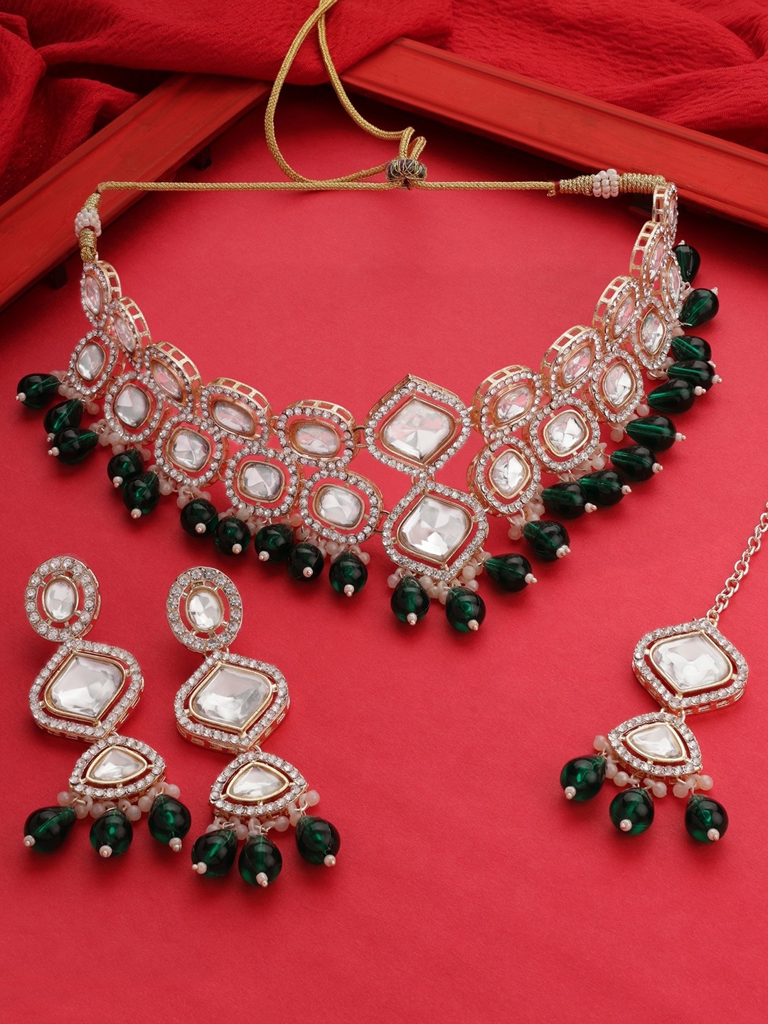 

Zaveri Pearls Gold-Plated Stone Studded & Beaded Jewellery Set